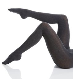 Slip into these comfortable knit tights to help keep the chill off! Made of polyester, cotton and spandex. Two-ply stretch knit waistband hugs you comfortably. Smooth, opaque sweater knit panty and legs. Heel pocket. Reinforced toe seam. Sewn-in cotton crotch panel is unlined. MeMoi Women's Flat Knit Sweater Tights in Grey (MO-325) | Size Large/XL | HerRoom.com Footless Elastane Tights With Comfort Stretch, Footless Comfort Stretch Elastane Tights, Winter Tights In Elastane, Tight Fit, Winter Elastane Tights, Footless Fitted Hosiery For Fall, Fall Footless Fitted Hosiery, Winter Footless Fitted Tights, Solid Elastane Legwear For Winter, Solid Color Elastane Legwear For Winter