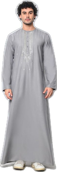 Ornate Reverence: Islamic Embroidered Men's Grey Thobe with Pockets - EastEssence.com Gray Traditional Wear For Eid, Traditional Gray Wear For Eid, Elegant Gray Kurta For Eid, Festive Gray Embroidered Kurta, Festive Embroidered Gray Kurta, Traditional Gray Kurta For Wedding, Elegant Kurta With Traditional Fit For Ceremonies, Elegant Traditional Fit Kurta For Ceremonies, Traditional Gray Kurta For Eid