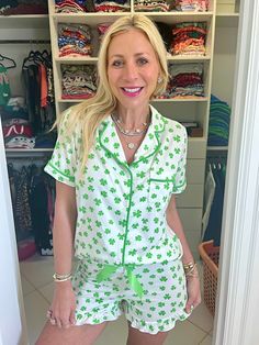 Feelin’ lucky? The Shamrock Pajama Shorts Set is here to bring all the charm and comfort you need! Designed for those who love a little festive fun, this set is as cute as it is cozy. Featuring a short-sleeve button-down top and ruffle-trim shorts, these PJs are made from our signature ultra-soft, extra-stretchy fabric—because feeling lucky should also feel comfy. Covered in playful shamrocks, this pajama set is perfect for celebrating St. Patrick’s Day, sipping on your morning coffee, or just e Green Pajamas, Ruffled Shorts, Shorts Pajama Set, Green Clover, Feeling Lucky, Short Loungewear, Clover Green, Sweater Tank Top, 13th Birthday