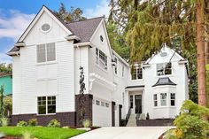 a large white house with lots of windows