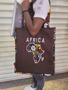 Ankara fabric may change from the original everything else remainAfrican Embroidery Leather Tote Bag | Handcrafted Boho Bag | Unique Ethnic Design Discover the perfect blend of tradition and style with this stunning leather tote bag featuring intricate African embroidery. Handcrafted with care, this bag showcases vibrant, detailed patterns inspired by African culture, adding a unique, artistic touch to your everyday look. Features: **Material: Premium quality genuine leather, soft and durable ** Fabric Shoulder Bag For Gifts, Fabric Shoulder Bag For Gift, Fabric Shoulder Bag Suitable For Gifts, Fabric Tote Gift Bag, Eco-friendly Fabric Rectangular Bags, Eco-friendly Rectangular Fabric Bag, Handmade Brown Fabric Bags, Eco-friendly Fabric Bag For Everyday Use, Eco-friendly Fabric Bags For Everyday