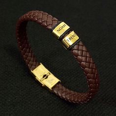 Looking for a unique and thoughtful gift for someone special? Look no further than Belle Fever Personalised Brown Leather Bracelet! Crafted from high-quality, hypoallergenic materials and handcrafted in-house, this bracelet is both durable and comfortable to wear, making it the perfect accessory for any occasion.The bracelet features a thick brown leather band that is solid and thick, giving it a premium feel. The steel plate on the bracelet can be inscribed with a name, date, or symbol of your choice, allowing you to create a truly unique and personal gift that will be treasured for years to come. The plate is securely fastened to the leather band with a small rubber, ensuring that it stays in place and remains looking great even after years of wear.The Personalised Brown Leather Bracelet Personalized Elegant Leather Bracelet As Gift, Personalized Elegant Leather Bracelet Gift, Elegant Personalized Leather Bracelet Gift, Elegant Personalized Leather Bracelet For Gift, Modern Wristband Bangle As A Gift, Modern Bangle Wristband For Gift, Modern Bangle Wristband As Gift, Modern Leather Bangle Bracelet As Gift, Modern Leather Bangle Bracelet For Gift