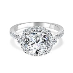 a white gold engagement ring with an oval center surrounded by round diamonds