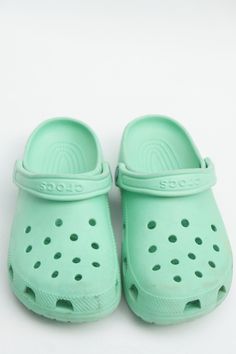 Mint Green Crocs clogs in good used shape. Size : 9 Casual Beach Slide Clogs, Casual Beach Clogs With Rubber Sole, Casual Beach Clogs With Round Toe, Casual Beach Clogs With Closed Toe, Casual Closed Toe Beach Clogs, Casual Closed Toe Clogs For Beach, Green Casual Clogs For The Beach, Casual Green Clogs For The Beach, Casual Green Clogs With Rubber Sole