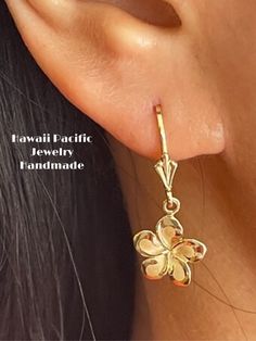 Elegant And Beautiful Hawaiian 14Kt Solid Yellow Gold 12mm Plumeria Flower Lever Back Dangle & Drop Earrings  Plumeria Flower Sandblast with a High Polished Edge 14 Karat Solid Yellow Gold GUARANTEED,  Authenticated with a 14K Stamp Made With Highest Quality Craftsmanship Solid 14K Yellow Gold Plumeria Flower Lever Back Dangle & Drop Earrings Total Weight 1.9 grams Solid 14K Yellow Gold Plumeria Flower  Width 12 Millimeters Length 12 Millimeters Drop Length 28 Millimeters Amazing Gift For Family And Friends! Jewelry Gift Box Included! Yellow Gold Flower-shaped Jewelry With Ear Wire, Yellow Gold Flower Jewelry With Matching Earrings, Stamp Making, Jewelry Gift Box, Solid Yellow, Gifts For Family, Jewelry Earrings Dangle, Dangle Drop Earrings, Dangle Earrings