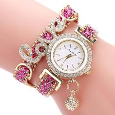 Metal and crystals Gold and diamonds Embellished bracelet design Fashion accessory Formal occasions Pair with elegant attire Ladies Bracelet Watch, Rhinestone Watches, Bracelet Watches Women, Wristwatch Fashion, Crystal Fashion, Womens Watches Luxury, Stylish Bracelet, Women Bracelet, Girls Watches