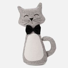 a gray and white cat with a black bow tie