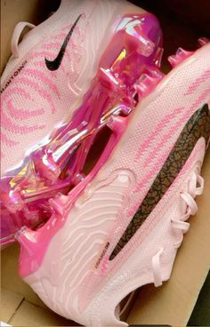 the pink nike air max sneakers are on display