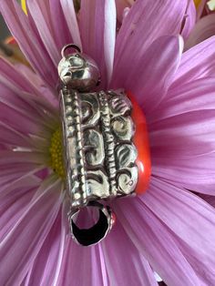 This beautiful and vintage handcrafted and handcarved Tibetan tribal theme pendant with Coral set in Tibetan silver is 2"inch tall and weighs around 13.37grams.Made in Himalayan region by skilled artisan. Pendant has flower design carved at back.Great piece for gift and collection of this unique pendant from Himalayan region.(note) listing price is per pendant.pls message me if you have any issues and questions before leaving negative reviews. I will try my best to resolve it. Thanks Bohemian Carved Sterling Silver Jewelry, Spiritual Carved Jewelry For Puja, Traditional Antique Silver Locket Jewelry, Traditional Antique Silver Jewelry For Collectors, Collectible Traditional Jewelry In Antique Silver, Traditional Carved Round Pendant Jewelry, Artisan Carved Pendant Jewelry, Traditional Silver Carved Necklace, Traditional Collectible Locket Jewelry