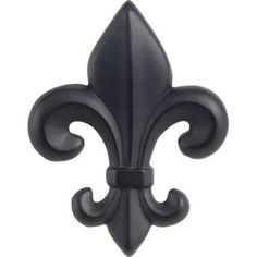 an image of a black fleur de lis wall decoration on a white background