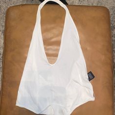 Nwt Express Bodysuit, White. White Halter Top For Spring Poolside, White Halter Top For Poolside Spring, White One-piece Beach Top, White Sleeveless Halter Top For Poolside, Casual White Halter Top For Night Out, White One-piece Casual Top, White Bodysuit For Summer Day Out, White Summer Bodysuit For A Day Out, White Bodysuit For Summer Night Out