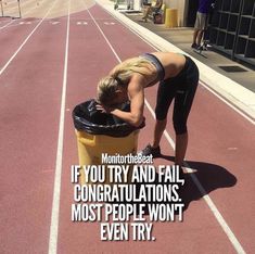 a woman leaning over a trash can on top of a race track with the caption if you try and fail congratulationss most people won't even try