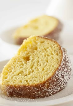 a close up of a cake on a plate with the words easy kentucky butter cake