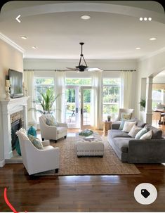 a living room filled with furniture and a fire place