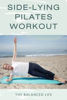 a man doing yoga on the beach with text overlay saying side - lying pilates workout