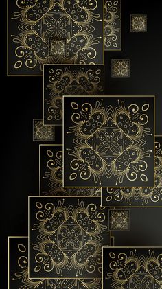 gold and black wallpaper with intricate designs