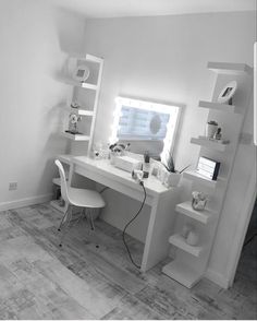 a white desk and chair in a room