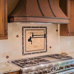 a stove top oven sitting inside of a kitchen next to wooden cupboards and cabinets