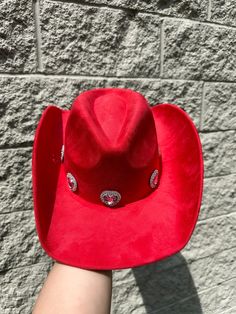 This Rosa Heart Western Hat in red features a heart rhinestone band, adding a touch of sparkle to your western style. Look fashionable and show off your unique sense of style with this one-of-a-kind accessory. Heart Rhinestone Band Interior Drawstrings For Adjustable Sizing Faux-Suede Thank You For Shopping At Berenis! All Western Hat Sales Are Final Red Adjustable Hat For Western-themed Events, Western Red Hat For Country Events, Red Western-style Party Hat, Red Western Style Party Hat, Red Western Hat Bands For Rodeo, Western Red Hat Bands For Country Events, Red Western Hat Bands For Country Events, Red Western Style Hat Band For Rodeo, Red Adjustable Country Hat Bands