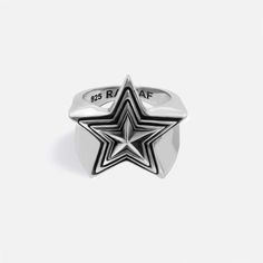 The iconic RAFTAF piece. Wear the star that brightens your dreams. MATERIAL  Made of 925 sterling silver, solid silver FINISHING (OPTIONAL) 925 Sterling Silver RING SIZE (OPTIONAL) Small: 6.5 US (Diameter: 16.8 mm) Medium: 8.5 US (Diameter: 18.4 mm) Large: 9 US (Diameter: 19.1 mm) X Large: 11.5 US (Diameter: 21 mm) WEIGHT 14 g PACKAGING You are in the right place to make your special gifts for him or her. All orders are nicely packaged ready to gift in cool RAFTAF boxes. DESIGN & CRAFTMANSHIP All RAFTAF pieces are designed by our talented and ambitious design team. Production process is carried out by experienced craftsmen in the Istanbul Grand Bazaar, which is famous for jewelry production for centuries. Please note that slight changes in colour and traces of the artisanal process are par Star Diamond Ring For Men, Star Jewelry Ring, Sirius Star Ring, Star Gifts For Men, Tupac Star Ring, Silver Star Ring, Boxes Design, Special Gifts For Him, Streetwear Jewelry