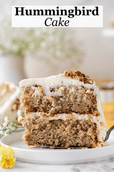 a slice of hummingbird cake on a white plate