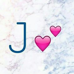 the letters j and j are made up of hearts on a marble background with blue lettering