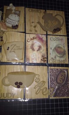 coffee themed coasters are arranged on a table