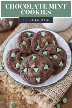 chocolate mint cookies on a plate with milk in the background