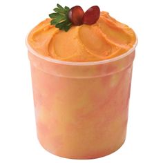 an orange drink in a plastic cup with olives on top