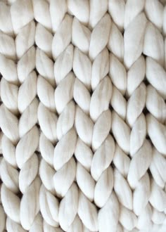 a pile of white wool is shown close up