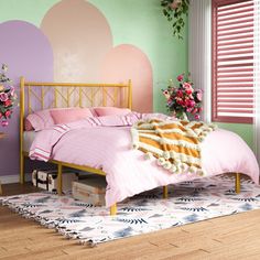 a bedroom decorated in pastel colors with pink and green accents