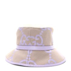 This is an authentic GUCCI Monogram Jumbo GG Mosteria Bucket Hat size small in Beige and Light Purple. This stylish hat is crafted of the iconic Gucci monogram canvas. Gucci Monogram, Stylish Hats, Hat Sizes, Monogram Canvas, Light Purple, Bucket Hat, Monogram, Gucci, Things To Sell