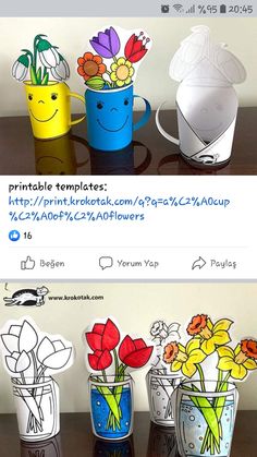 three vases with flowers in them sitting on a table next to an email post