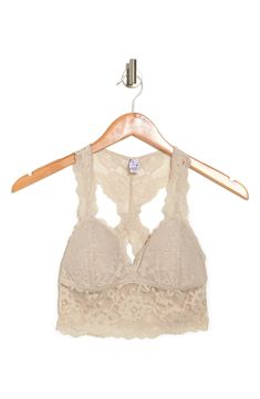 A sultry floral lace bralette with a back cutout offers a sophisticated style that can be worn as bold standout piece or a supportive underwear. V-neck Shell: 86% rayon, 14% spandex; lining: 95% polyester, 5% spandex Hand wash, dry flat Imported Chic Lace Crop Top Bra Friendly, Spring Lace Bra With Lace Closure, Lace Bra With Lace Closure For Spring, Lace Bra For Spring, Chic Lace Bra With Lace Closure, Fitted Low-cut Lace Bra, Chic Fitted Bra With Delicate Lace, Chic Lace Bra With Lace Trim, Lace Bra With Lace Closure For Night Out