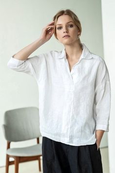 Buttonless linen shirt for women with 3/4 length sleeves.  It is an oversized shirt and loose fit with a deep décolleté. It will be perfect work shirt or casual shirt - you name it.  #naturallinen #linenshirt #whiteshirt #whitelinenshirt #casualshirt #whiteblouse #ecofashion Loose Linen Shirt, Casual Linen Shirt, White Linen Blouse, Shirt Linen, Cutaway Collar, Linen Tunic, Linen Blouse, Laid Back Style, Linen Top