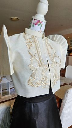 Leonie#4 Filipiniana Bolero Embroidered, beige, made in the Philippines, ship from Australia.  Premium quality and affordable piece to add into your wardrobe to match with dresses, skirts or pants for any events (Multicultural, Citizenship, Weddings, etc)  for your instant Filipiniana look at affordable price. Let's all be proud to wear our Filipino culture and heritage. Note: dress and necklace excluded.   Before placing order,  please check sizing chart provided and specially the shoulder size Female Barong Outfit, Elegant Short Sleeve Sets With Floral Embroidery, Fitted Embroidered Beige Sets, Elegant Cream Short Sleeve Sets, Elegant Beige Sets With Gold Embroidery, Fitted Cream Sets With Gold Embroidery, Formal Cream Sets With Floral Embroidery, Cream Sets With Floral Embroidery For Formal Events, Formal Cream Sets With Gold Embroidery