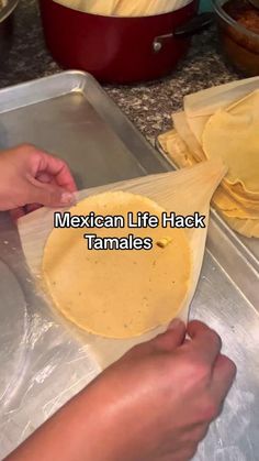 someone is making mexican life hacks with tamales and tortilla wrappers