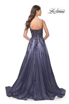 La Femme 32185 Two tone tulle gown with full a-line skirt and ruching along the bodice. The dress features a beaded and sequin floral applique. Back zipper closure. A-line Ball Gown For Debutante Ball And Prom Season, A-line Ball Gown With Sweep Train For Prom Season, A-line Tulle Gown For Prom, A-line Tulle Ball Gown For Prom Season, Tulle A-line Gown For Gala, A-line Tulle Gown For Gala, Tulle A-line Ball Gown With Fitted Bodice, A-line Tulle Gown With Sheer Bodice, A-line Gown For Debutante Ball And Prom Season