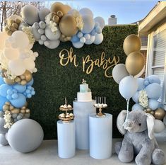 a baby shower party with balloons and decorations