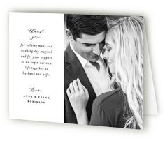 a wedding card with an image of a couple holding each other