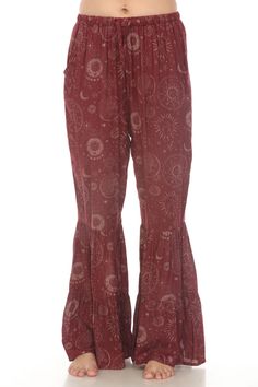 Find your sense of bohemian elegance with our Celestial Flowy Ruffle Hem Pants. These pants combine a light and comfortable fabric with a vibrant celestial print style and feature two front hand pockets as well as an elastic waist with a draw string for a comfortable fit. They are the perfect addition to any free spirit's wardrobe. Celestial Print, Hem Pants, Ruffle Design, Yoga Dance, Ruffle Pants, Front Hand, How To Hem Pants, Print Style, Ruffle Hem