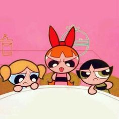 the powerpuff girls cartoon characters are standing in front of a pink wall and looking at each other