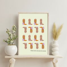 an art print with cowboy boots on it