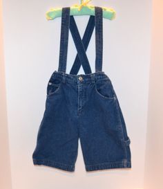 Vintage overalls in excellent condition.  The shorts have straps that can be shortened with inside buttons.  The painter style pant has side handle, slant pockets and straight leg.  Elastic back for a comfy fit.   Check out the measurements, they are right on.  Extremely well preserved, machine washable. Measurements: Waist-20 to 23 inches Hips-up to 30 inches Inseam-7 inches fits like size small to 6 Adjustable straps Denim one piece overall. Thanks-fresh inventory daily: https://www.etsy.com/s Spring Overalls With Belt Loops, Spring Denim Bottoms With Suspenders, Medium Wash Denim Bottoms With Suspenders, Retro Denim Blue Overalls, Denim One Piece, Painter Style, Vintage Denim Blue Overalls, Vintage Denim Bib Front Shortalls, Vintage Denim Blue Cotton Shortalls