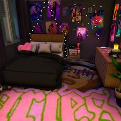 a bedroom decorated in neon colors with pictures on the wall