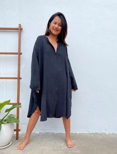 Relax in style with the Aura shirtdress, a unique take on traditional loungewear. Made from breathable double gauze cotton, it's perfect for casual wear out, at home, or even as a beach coverup. The button-down design adds a touch of style and versatility to your wardrobe, ensuring comfort and convenience as you go about your day. Black Cotton Tunic For Summer, Casual Cotton Gauze Long Sleeve Dress, Casual Long-sleeved Cotton Gauze Dress, Casual Long Sleeve Cotton Gauze Dress, Summer Long Sleeve Tunic For Loungewear, Beachwear Tunic With Relaxed Fit And Long Sleeves, Long Sleeve Relaxed Fit Tunic For Beach Cover-up, Beach Long Sleeve Lagenlook Tunic, Relaxed Fit Long Sleeve Tunic For Beach