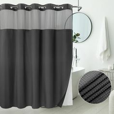 the shower curtain is black and grey in color