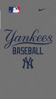 the new york yankees baseball team logo on a gray shirt with blue and red lettering