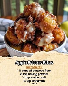 a bowl filled with apple fritter bites on top of a table