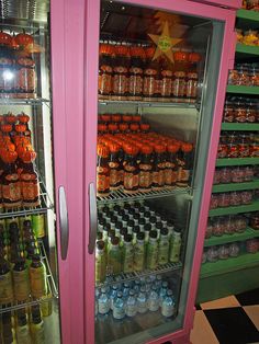 a display case filled with lots of drinks